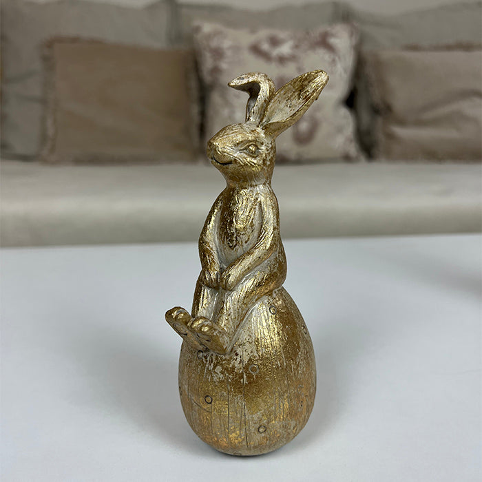 Semina tojáson ülő nyúl dekoráció 15.2cm világos arany